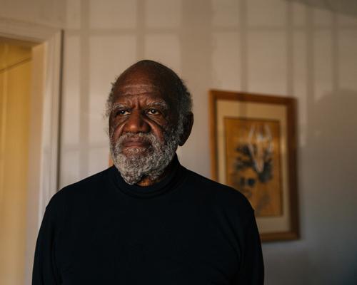 Portrait of Jack Guillebeauz in his living room late in the day 